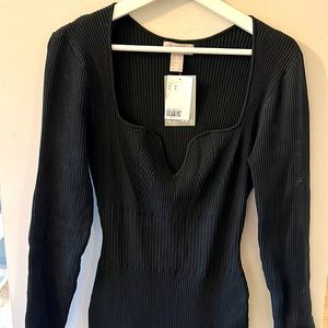 HM black midi knit dress in size medium.